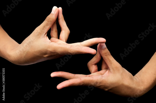 Pair of Hands Showing mudra sign, mudra yoga isolatedd in black, high quality image.