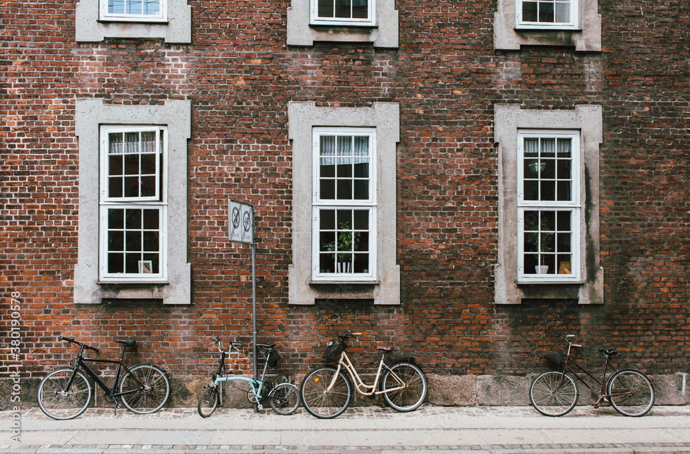 Bikes leaning on wall Bikes leaning on wall