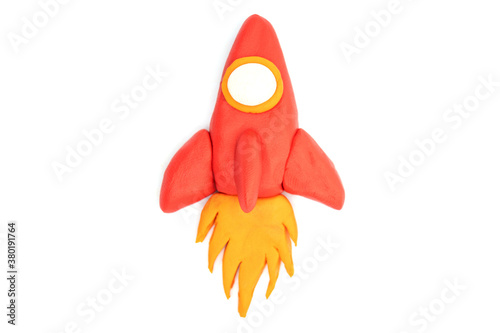 Fototapeta Naklejka Na Ścianę i Meble -  Play dough Rocket on white background. Icon rocket. Handmade clay plasticine