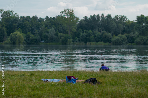 Relaxing on Podebrady lake in Olomouc on a hot summer day.
