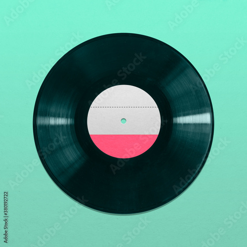 Retro Vinyl record with dust isolated on blue background, pop art design, close up