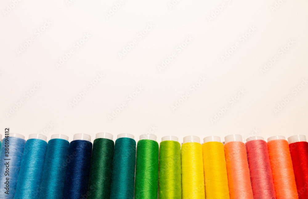 Color sewing threads on white background Color sewing threads on white background