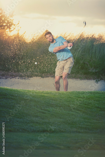 Golfer Hitting Out Of Sand Trap