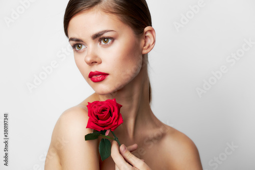Beautiful woman with rose spa treatments model cute face light 