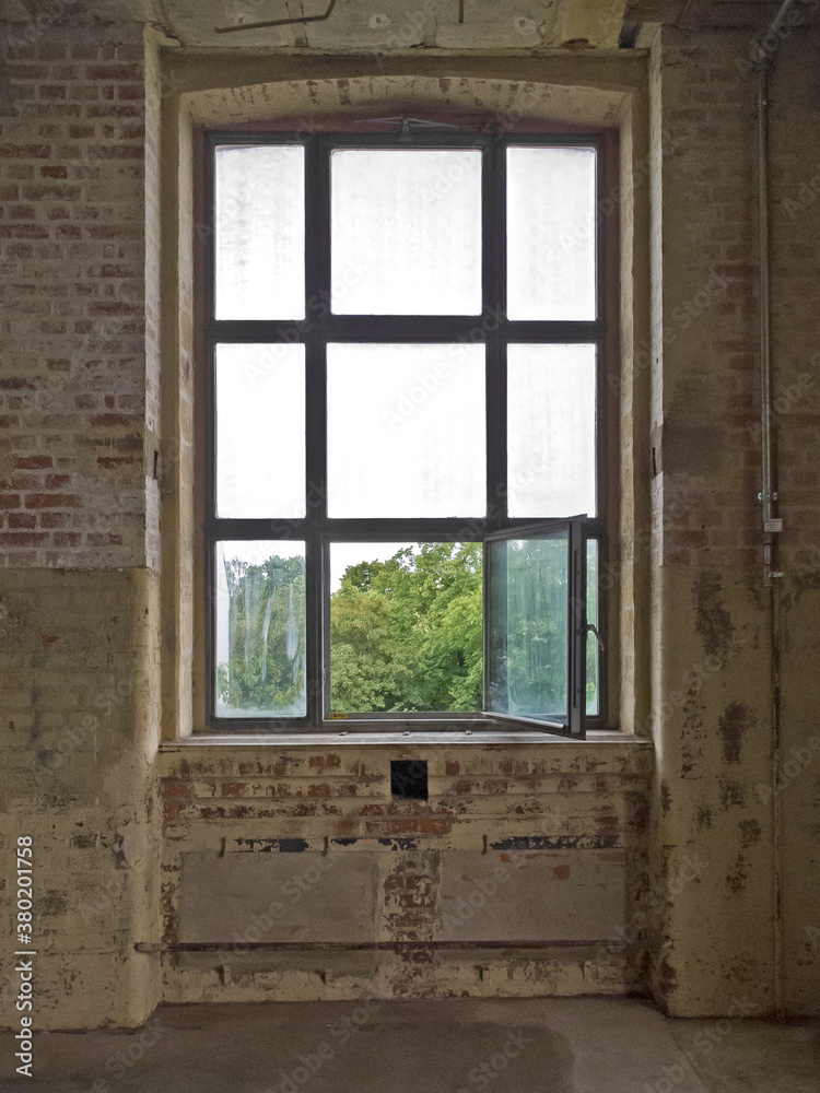 © Mellimage/Stocksy - open window in an old decaying hall © Mellimage/Stocksy - open window in an old decaying hall