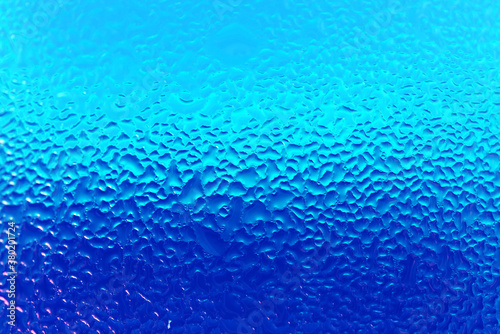 Texture of Water Droplets on Chilled Drink Glass in Blue Color Gradation