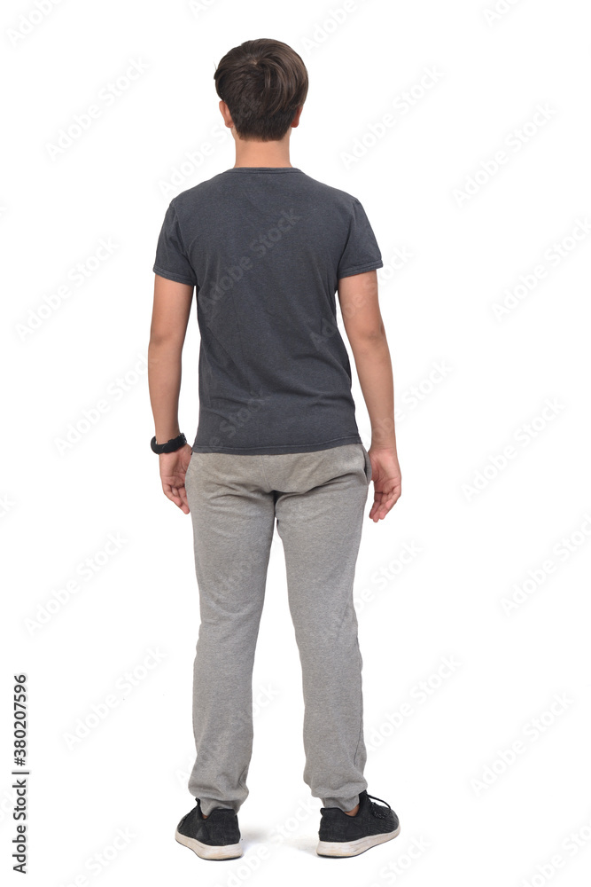 rear view of teenager boy wearing sportswear standing on white background, rear view of teenager boy wearing sportswear standing on white background,