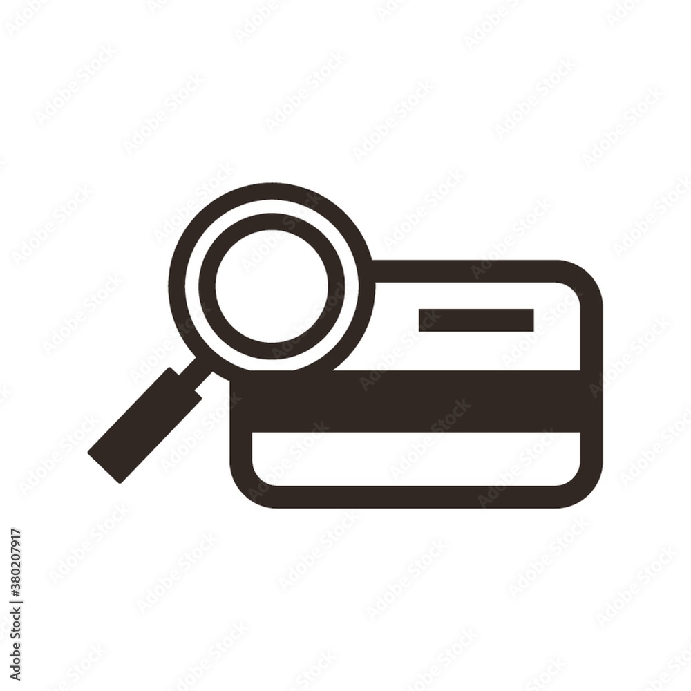 Credit card with magnifying glass Credit card with magnifying glass