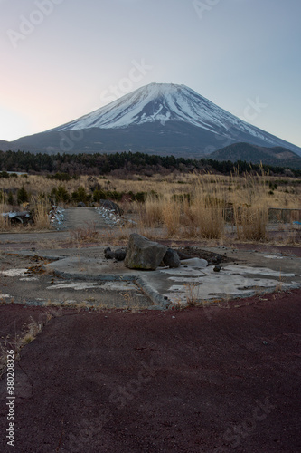 Mt Fuji at dawn seen across a derelict park