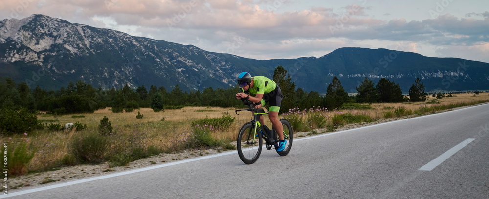 triathlon athlete riding bike