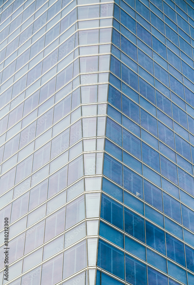 Modern building - skyscraper details on financial district of a city Modern building - skyscraper details on financial district of a city