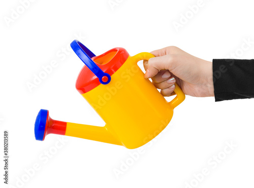 Hand with watering can