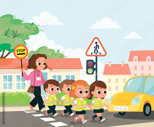 Teacher and school kids cross the street. Children, pupils babysitter, nurse, cross the street by crosswalk. Traffic lights.