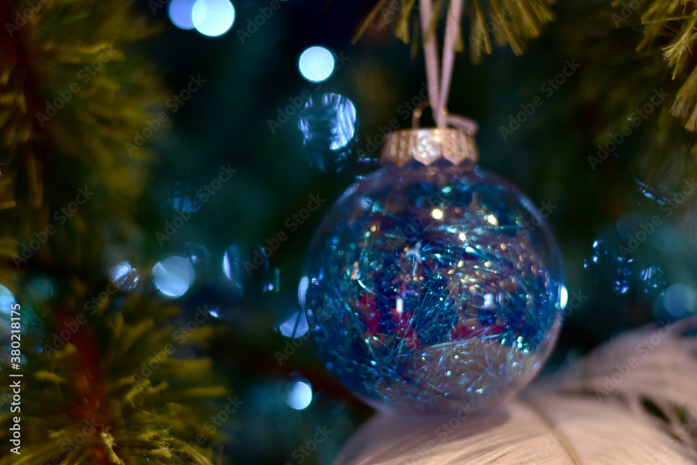 Closeup of Christmas Ball on Christmas Tree with bokeh beautiful background for design and decoration, new year concept, selective focus. Closeup of Christmas Ball on Christmas Tree with bokeh beautiful background for design and decoration, new year concept, selective focus.