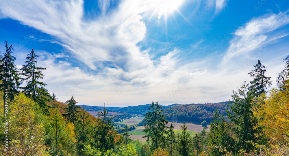 View of the valley in the Kellerwald-Edersee National Park, in Germany, on a sunny autumn day - obrazy, fototapety, plakaty 