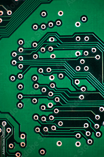 Close up of a printed green computer circuit board photo