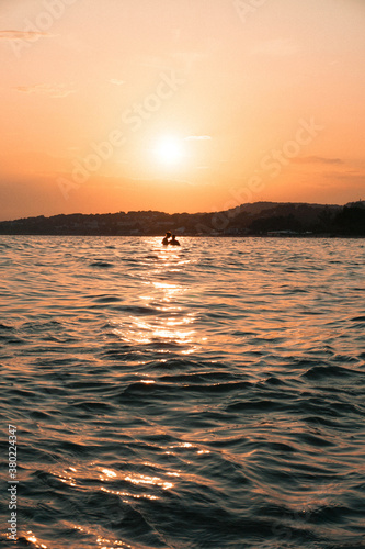 Sunset by the ocean