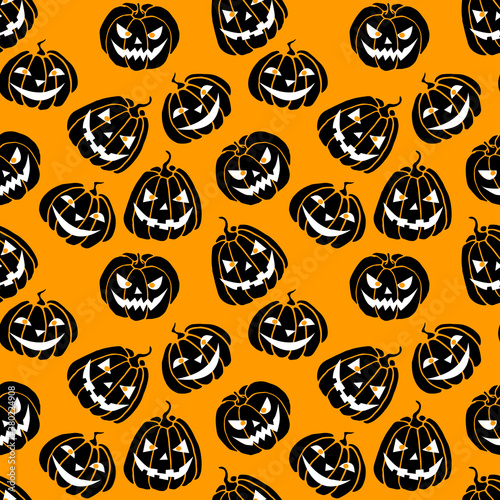 Seamless pattern with black Pumpkins isolated on orange background. Halloween vector texture