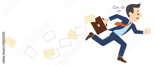 書類を落としながら走るビジネスマン 