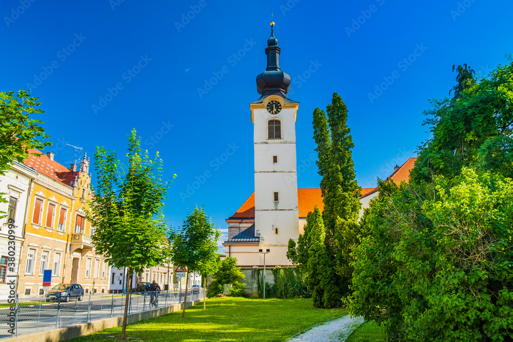 Church and city park in town of Koprivnica in Podravina region in Croatia