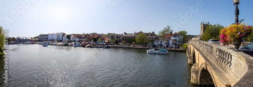 View from the bridge over the River Thames at Henley in Oxfordshire, England. Wide panoramic landscape