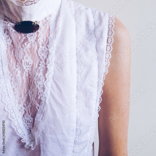 Vintage brooch on a vintage lace shirt.