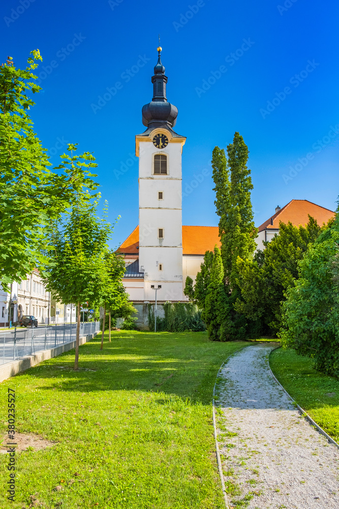 Church and city park in town of Koprivnica in Podravina region in Croatia