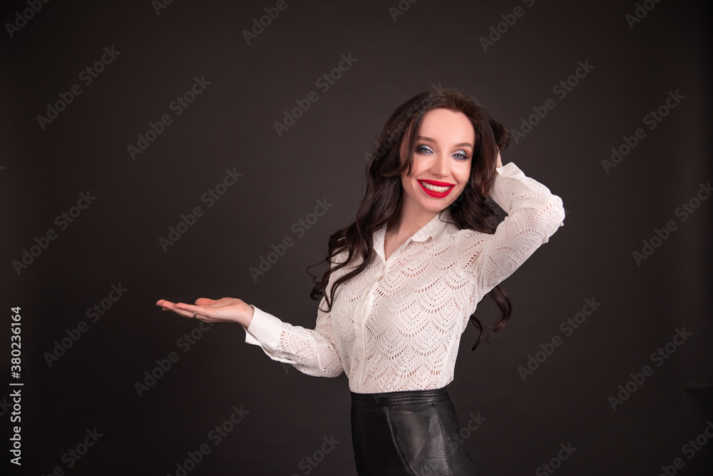 Business woman, isolated over black background. girl showing open hand palm with copy space for product or text. Business woman, isolated over black background. girl showing open hand palm with copy space for product or text.
