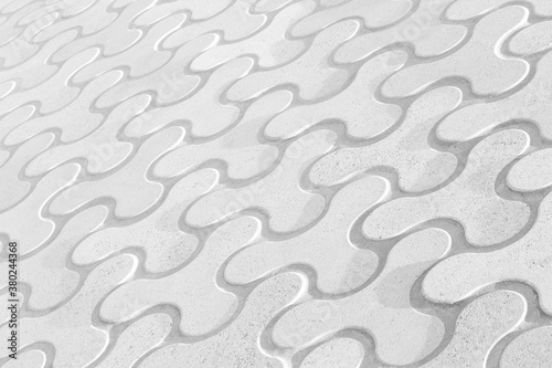 Fototapeta Naklejka Na Ścianę i Meble -  Close-up of abstract geometric white stone slab pattern in black and white. Focus on the front. High resolution full frame textured background.