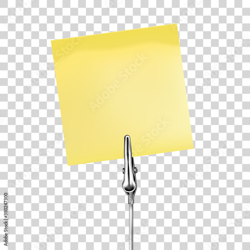 Yellow note on a metal memo holder clip. Note on wire silver clamp with place for you text over transparent background. Office supplies. Vector illustration.