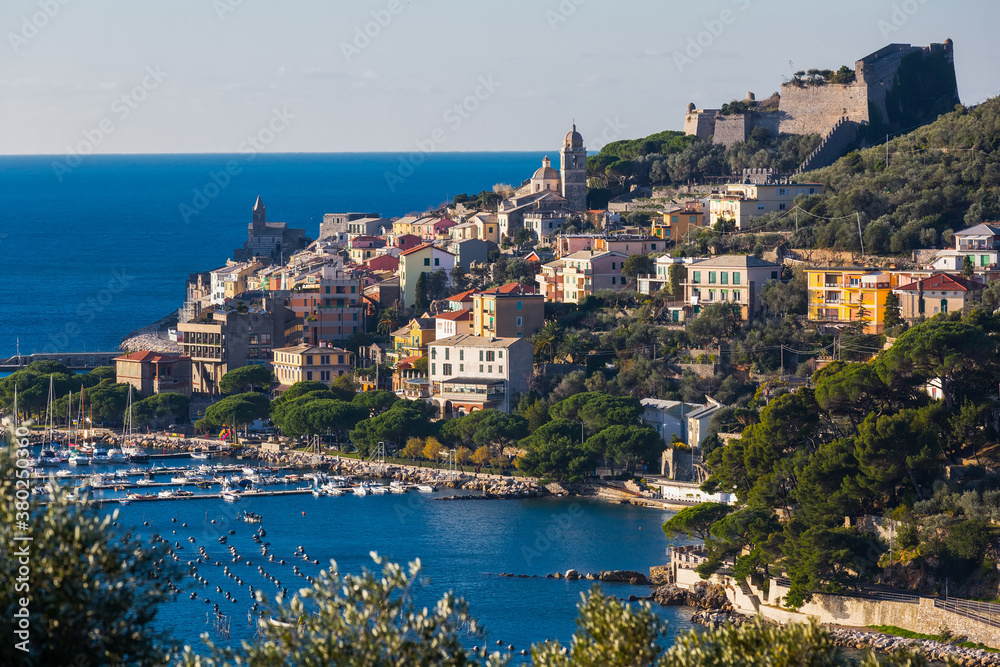 Portovenere La Spezia apartments and boats from sea view at Italy at sunny day..