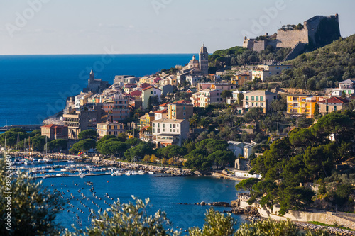 Portovenere La Spezia apartments and boats from sea view at Italy at sunny day..