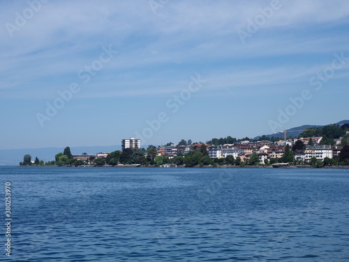 Wonderful view of Lake Geneva and european Montreux city in canton Vaud in Switzerland, clear blue sky in 2017 warm sunny summer day on July.