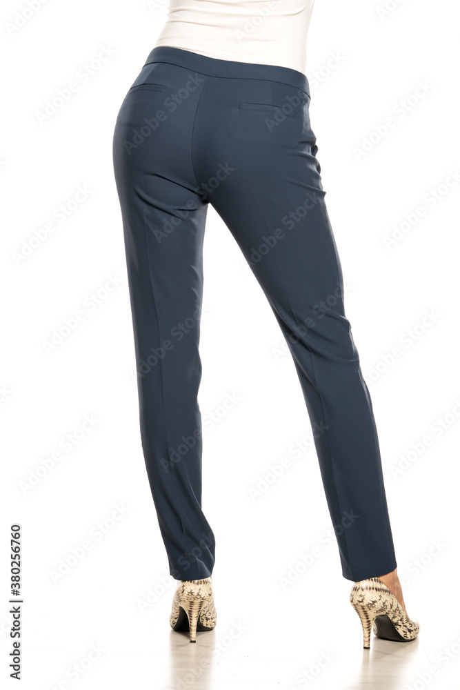 Back view of young business woman's legs in a pants Back view of young business woman's legs in a pants