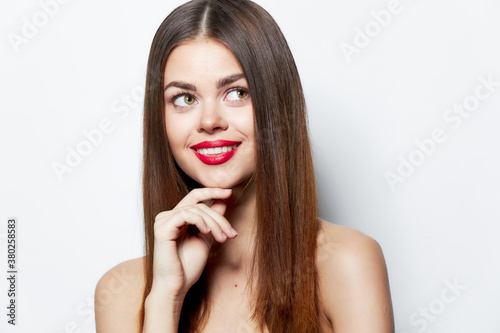 Woman with long hair Flirt and look away bright makeup Copy space