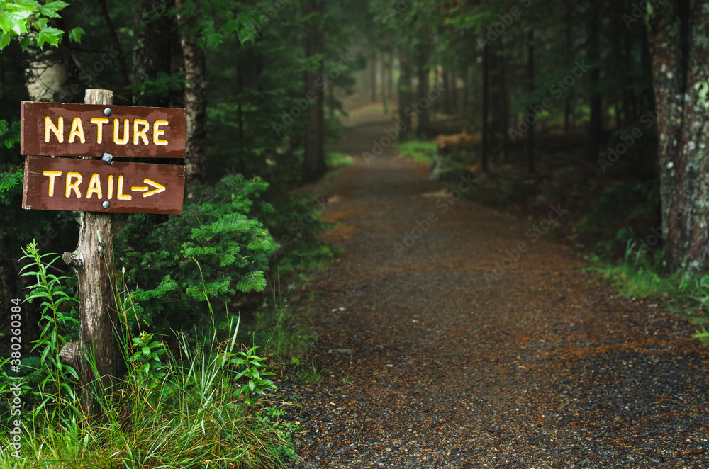 sign point to an easy, accessible nature trail sign point to an easy, accessible nature trail