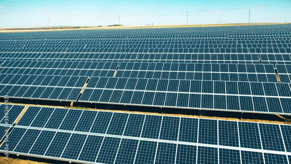 Field with a solar electric plant installed on it Field with a solar electric plant installed on it