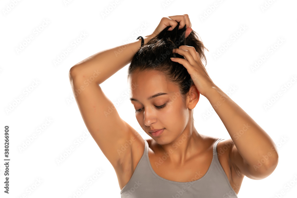 Yong arabic woman tie her hair Yong arabic woman tie her hair