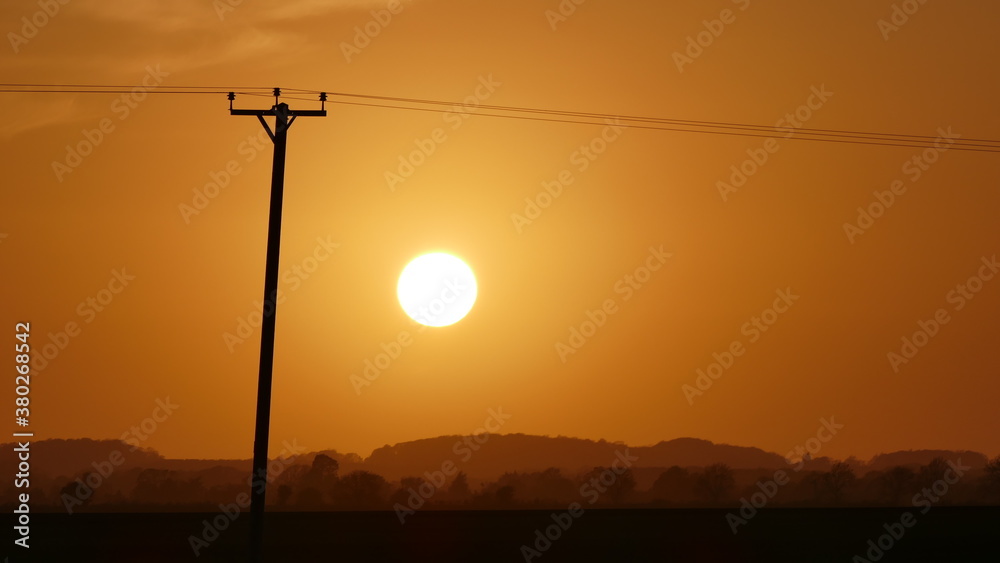 Naklejka premium Hazy sunset over Lincolnshire