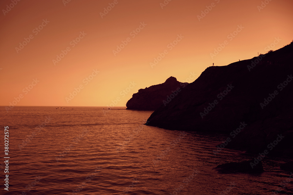 Sea mountains at sunset