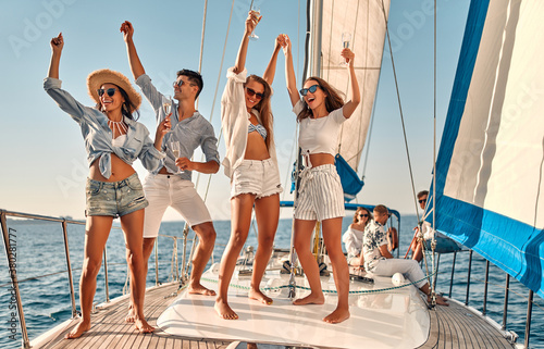 Friends on yacht © Vasyl