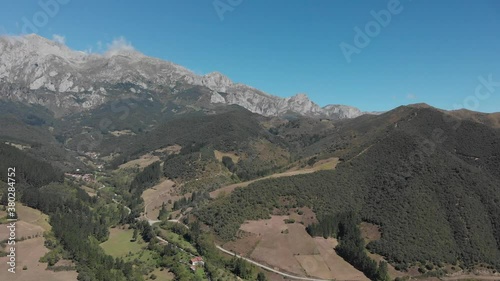 DRONE AERIAL FOOTAGE: The Picos de Europa (Peaks of Europe) a mountain range part of the Cantabrian Mountains in northern Spain. photo