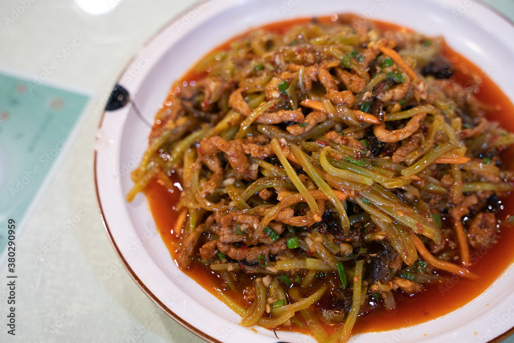 Fish-flavored shredded pork with sichuan pepper spicy sauce, a traditional Sichuan dish in China. Fish-flavored shredded pork with sichuan pepper spicy sauce, a traditional Sichuan dish in China.