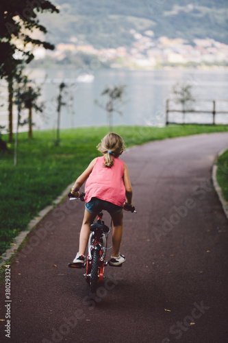 Wallpaper Mural Little girl on a bicycle Torontodigital.ca
