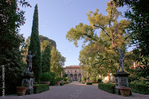 Giardino Corsini al Prato, Florence, Tuscany, Italy: view of the palace down the main path: trees and statuary photo