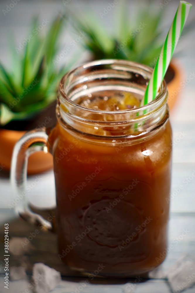 iced coffee with a reusable straw iced coffee with a reusable straw