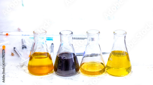 Solvent extraction from herbs and fungi for the purpose of drug treatment in viral diseases, cancer and malaria by testing the extract in the Erlenmeyer flask into the laboratory photo