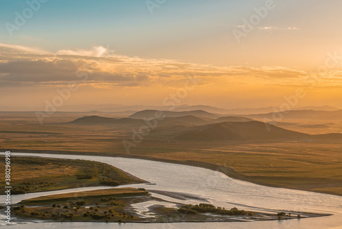 The sunset landscape of yellow river winding up in Ruoergai grassland, in Sichuan, China.