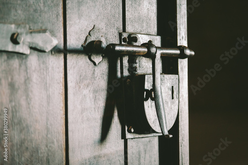 Medieval Padlock on a Wooden Door
