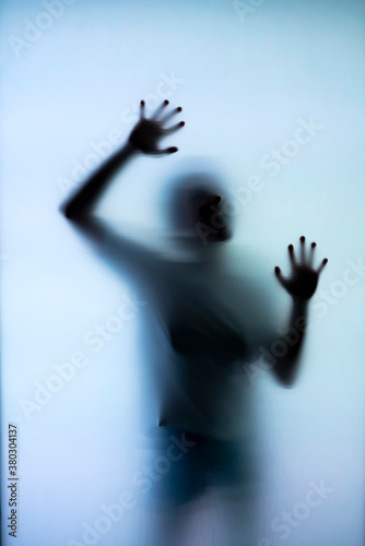 Wallpaper Mural Silhouette of a woman behind the glass Torontodigital.ca